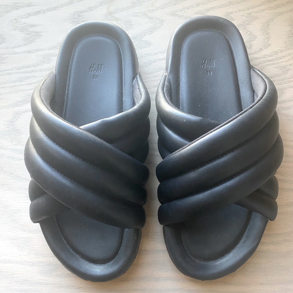 Black puffy slides